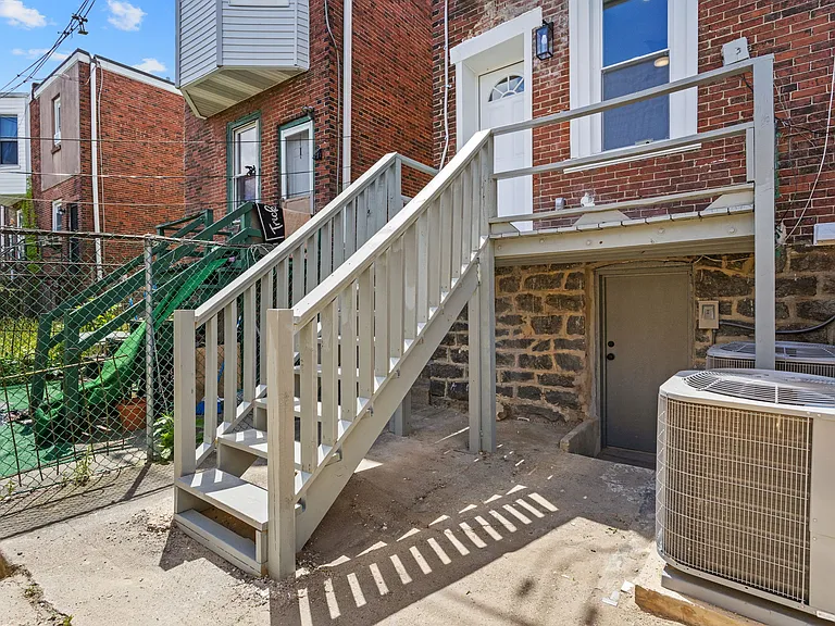 Back deck & patio (exclusively for Unit 1)