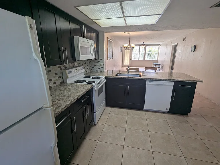 104 Palm Beach Trace Dr #A — Photo 3