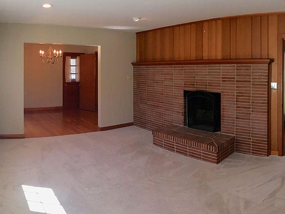 Formal living room with gas fireplace