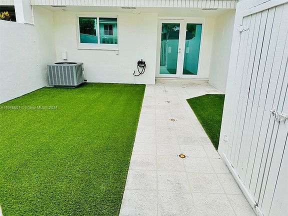 EXTERIOR FRONT WITH HURRICANE WINDOWS