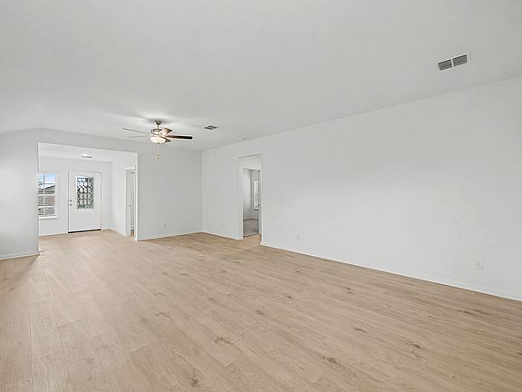 An open layout allows for fluid movement from room to room.