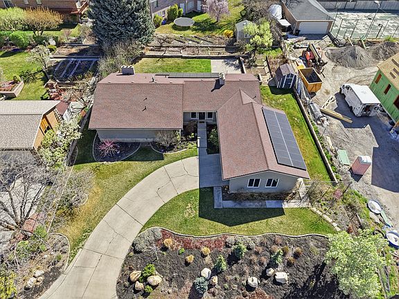 1/3 acre of mature landscaping, fruit trees, and gardens.