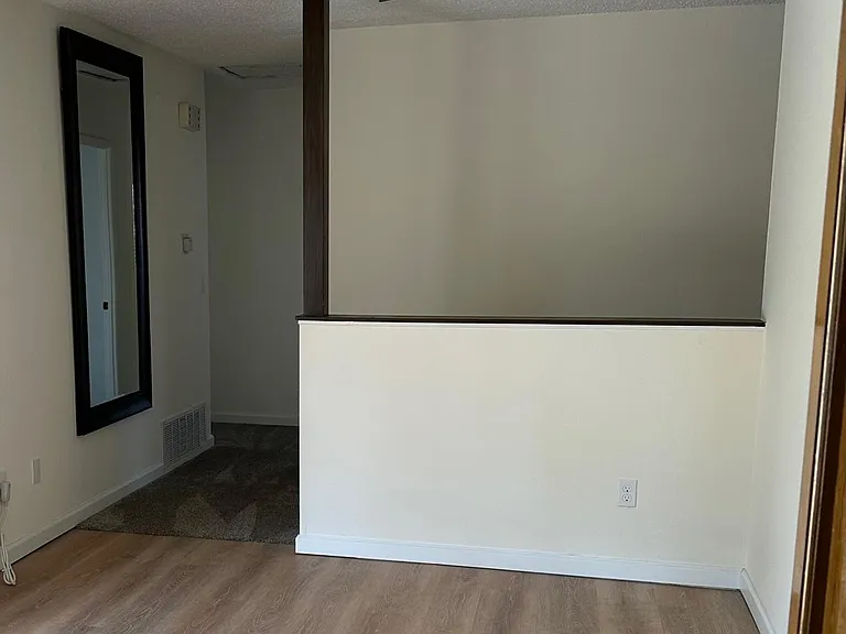 Dining Area Looking Toward Hallway To Bedrooms