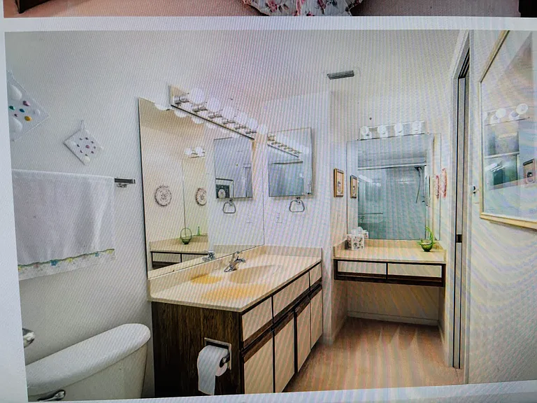 "Primary bedroom with attached bathroom