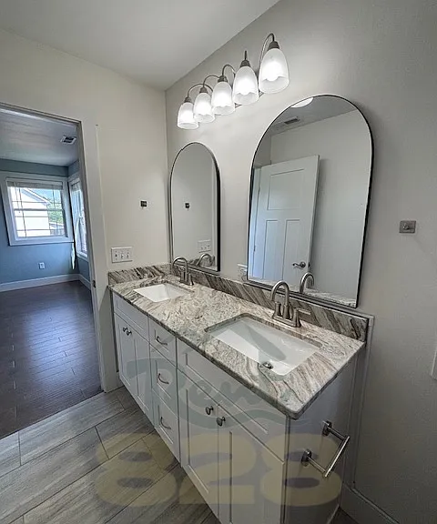 ensuite primary bathroom with double vanity