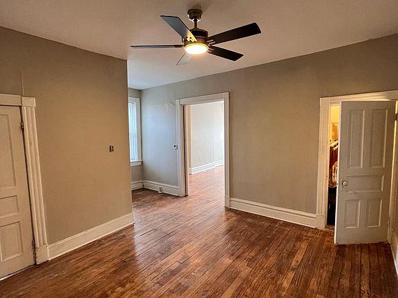 middle room looking towards pocket door leading to front room
