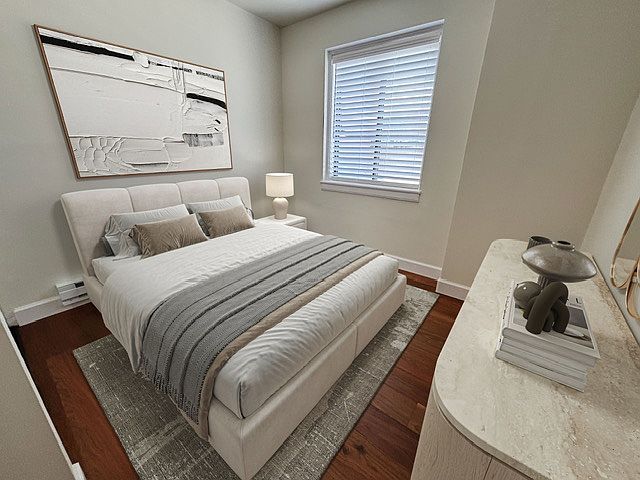 unit 801 unfurnished updated bedroom with mirrored closet doors