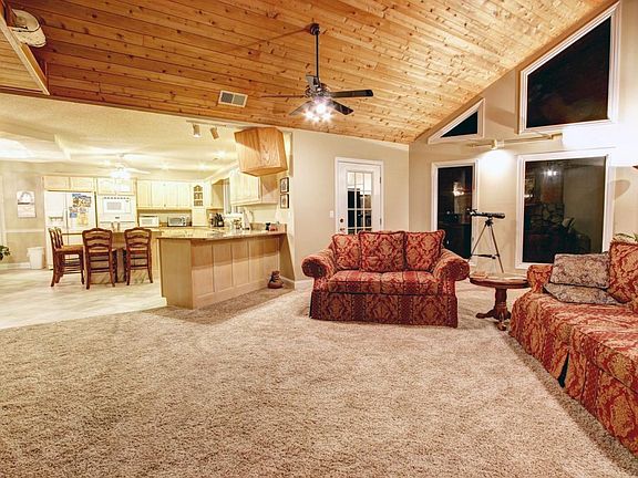 Main Level Living room looks into kitchen