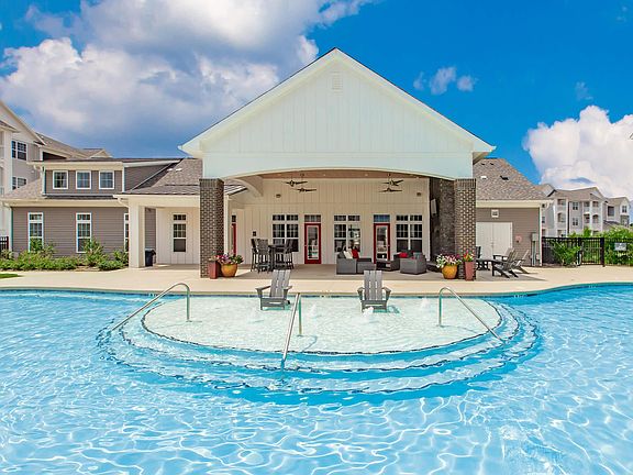 SOAK UP THE SUN BY OUR SHIMMERING SWIMMING POOLS