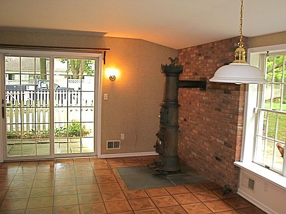 Eating Area of Kitchen with Slider to Patio