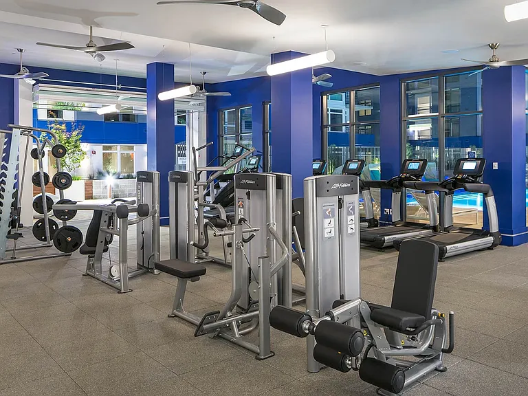 Work out in the fitness center featuring a yoga studio and spin room