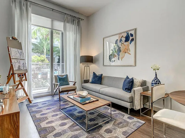 Living Room With Outdoor Patio View Through Sliding Glass Door