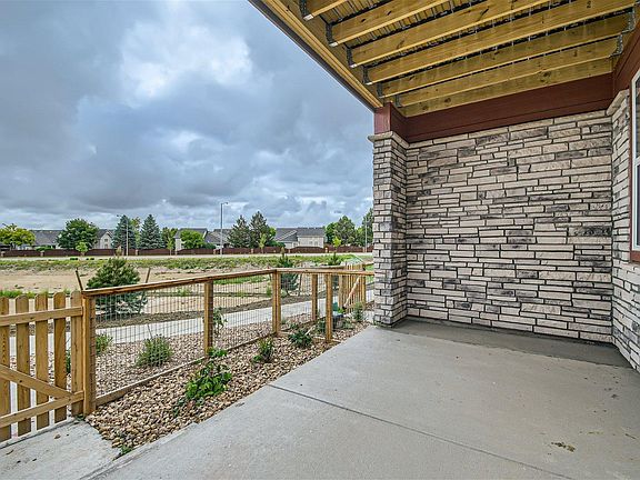 Enjoy your front patio - large enough for outdoor furniture!