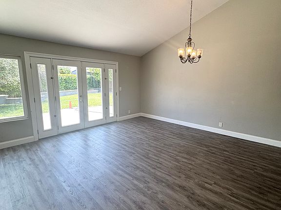 Dining room with cathedral ceiling and direct backyard access