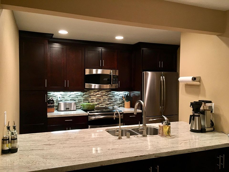 Updated kitchen with GE Profile appliances, soft close cabin