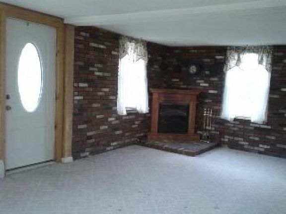 Living Room with brick