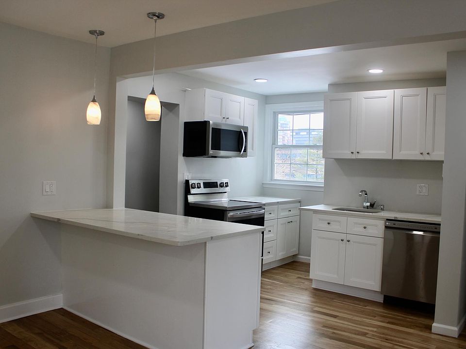 Everything new and never used- fridge and laundry through the alcove.