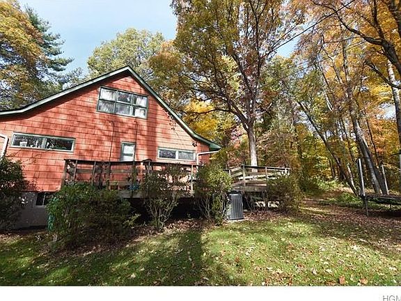 Side of home showing only a part of the wrap around deck.