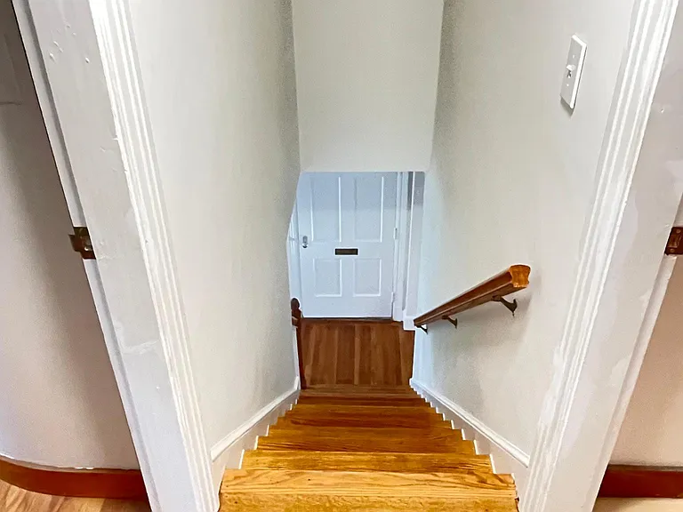 Stairs down to first floor