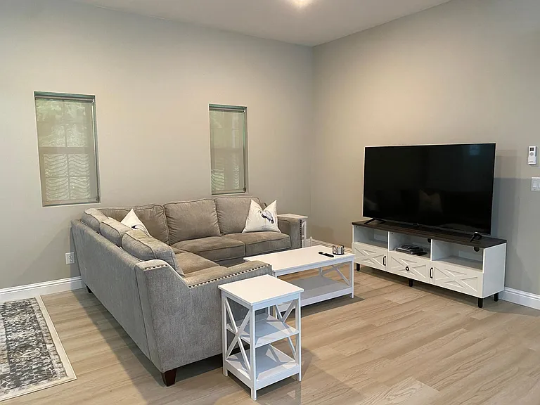 Living room with brand new 4 k tv.