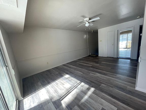 Living room-Sliding Doors lead to the patio This view is from the glass sliding doors