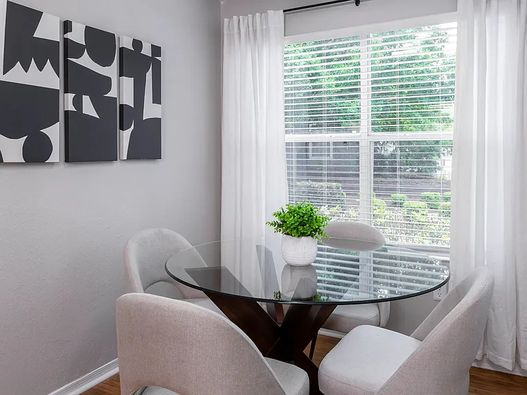 Let the sunshine inthis solarium offers the perfect nook for a dining table or reading space, bathed in natural light.