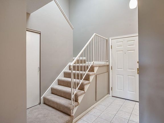 Entry way and stairs to the lofted second bedroom. 