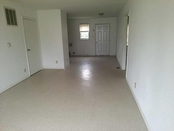 Living room view into dining room