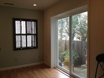Living room with access to back yard