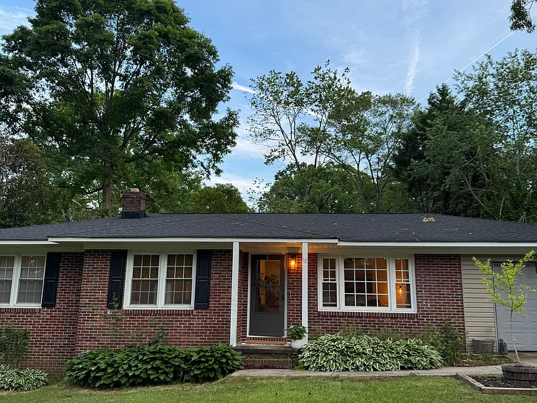 Welcome! 3 bed 2 bath original brick home situated on top of a gentle slope corner lot in a quiet, centrally located Greenville neighborhood.