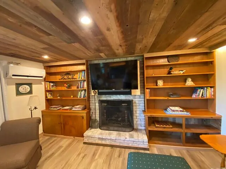 Family Room - Book cases , Fireplace, 50" Smart TV, Sonos playbar