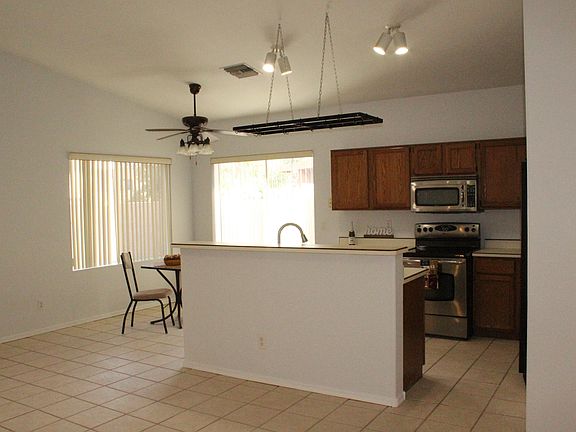 5th image of 9079 N Palm Brook Dr