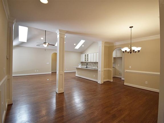 Dining room with chair railing and crown molding