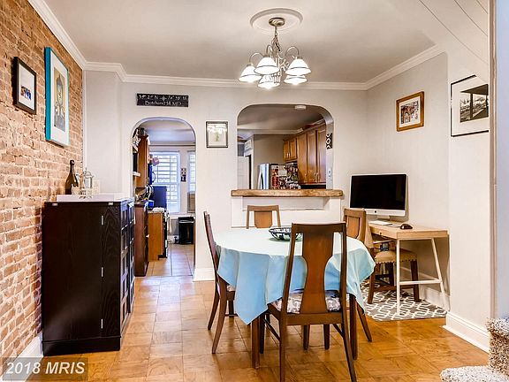 Dining Room with Exposed Brick