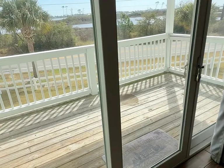 A spacious balcony extends directly off the living room, offering plenty of room for outdoor seating. Enjoy watching boats travel the intracoastal waterway, dolphins, birds anad other wildlife.