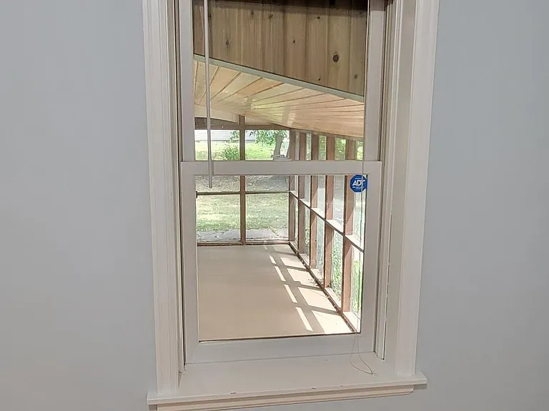 Bedroom 1. looking into the screen porch.
