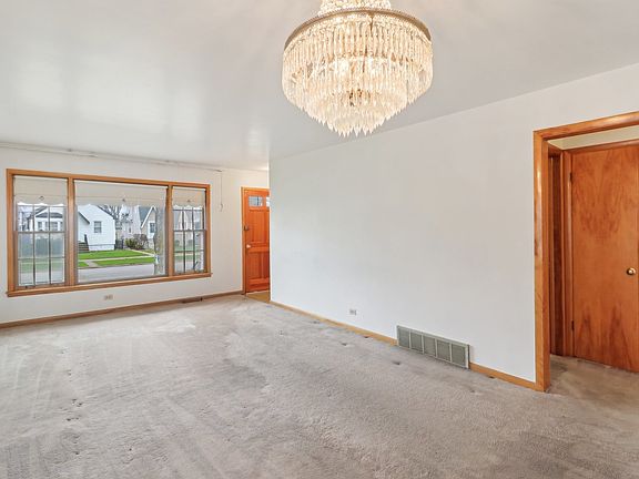3rd image of 3319 N Ozanam Ave
