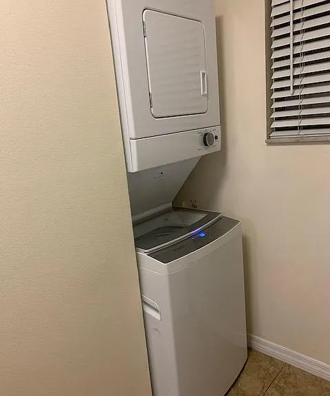 Stackable Washer and Dryer inside Condo.
