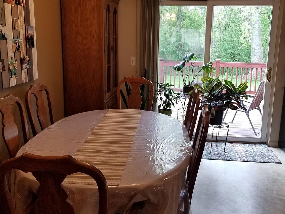Dining area with view of deck.