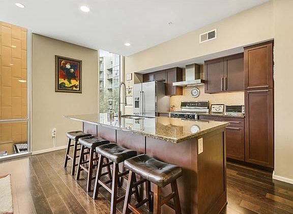 Spacious island offers convenient bar seating.