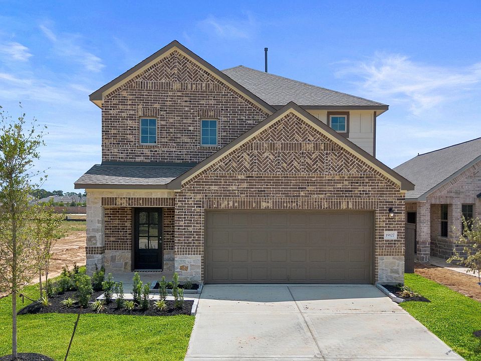 Welcome home to 19135 Hazel Firs Lane located in the community of Emory Glen and zoned to Magnolia I