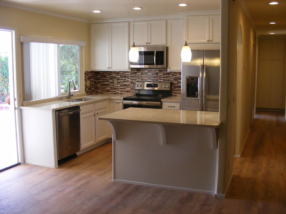 All new kitchen, cabinets, SS appliances, quartz counter top