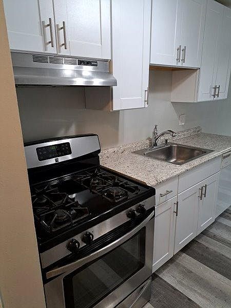 Brand new kitchen cabinets and flooring. Plenty of storage space