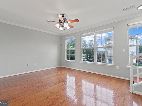 Large living room space with lots of lighting