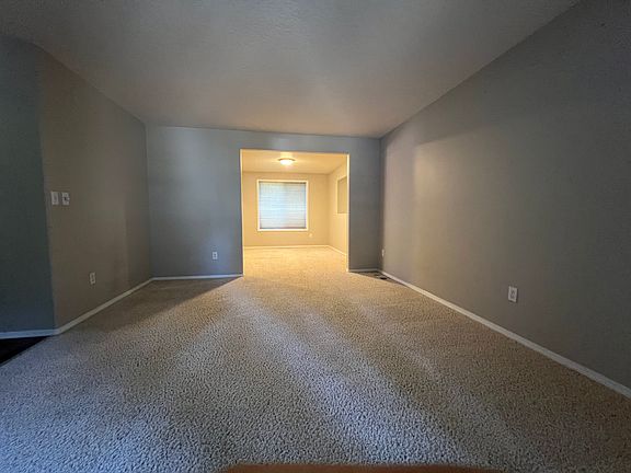 living room which connected to formal dinning room