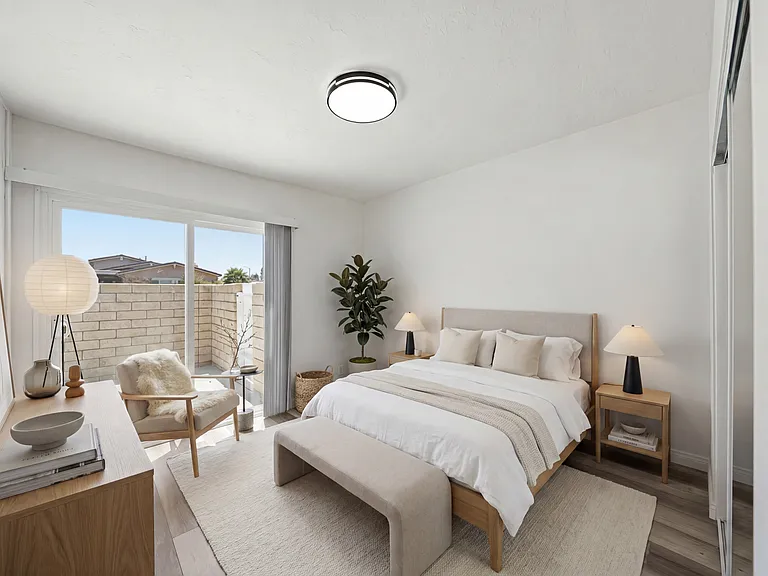 Bedroom 1 with enclosed private patio.