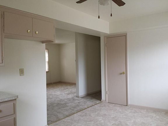 Kitchen space looking into living area
