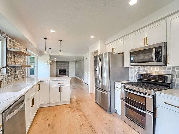 3rd image of 9923 E Exposition Ave