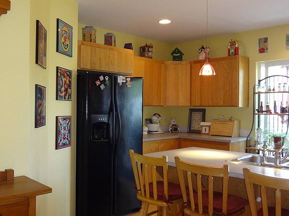 kitchen and island
						:
						island has breakfast eating area. more cabinets/counters