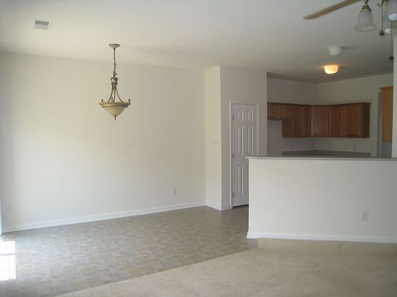 Dinette w/ Sliding Door Leads To Backyard